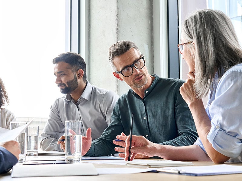 Diverse business people partners group negotiating at boardroom meeting